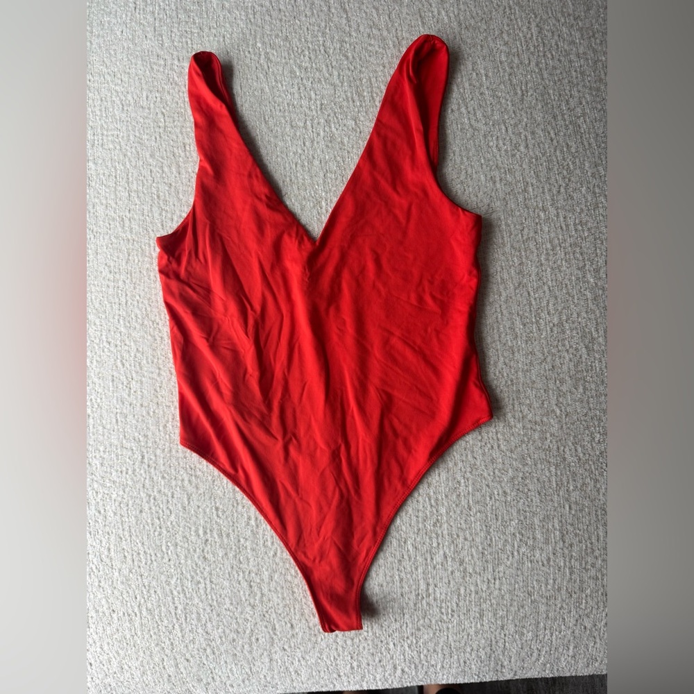 Bright Orange bodysuit size L